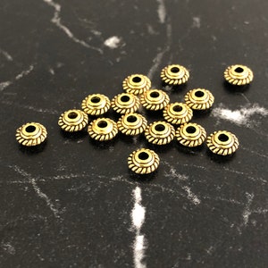 20 Gold saucer spacer beads