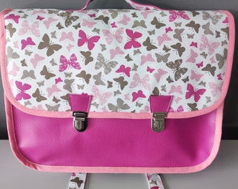 Kindergarten schoolbag (34cm x24 cm), pink imitation leather and butterfly fabric with label holder, adjustable straps.