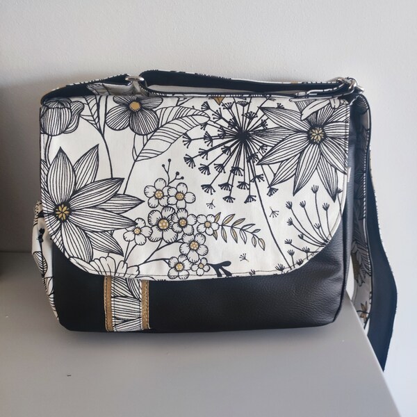 Superbe sac besace simili cuir noir et tissu fleurs, multi-poches, travail soigné.