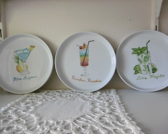 6 round plates for dessert in hand painted china, decorated with a cocktail glass