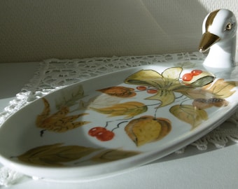 Hand-painted porcelain foie gras dish decorated with autumn leaves, physalis and a large yellow bow