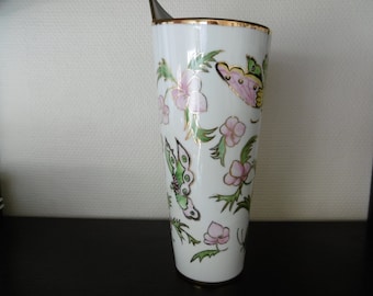 Asymmetrical vase in hand-painted porcelain decorated with butterflies and flowers with gilding