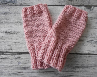 Handmade wool mittens in pink color, knitting mittens, knitting, handmade