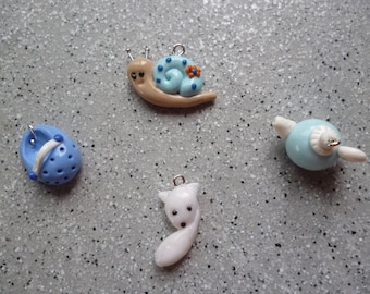 Polymer clay snail set, teapot, fangs, dog made by hand without mold