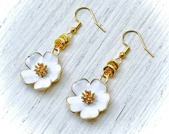 Romantic gold-plated hook earrings with white or pink enamel flower pendant and round beads for women