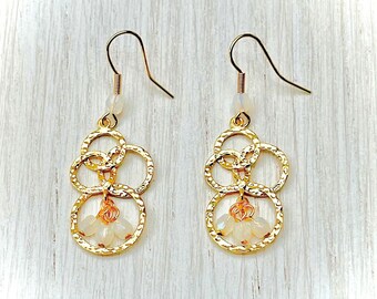 Graphic earrings in gold-plated brass graphic pendant with hammered circles and pearly white opal beads for women