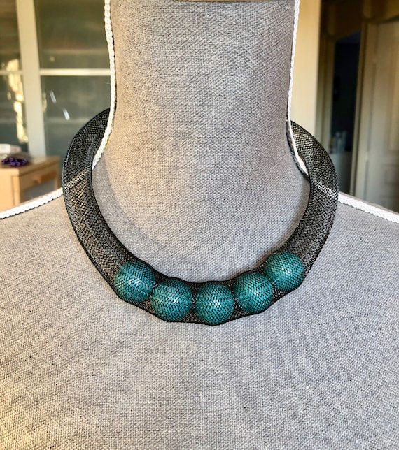 Black fishnet necklace with 5 turquoise and black beads
