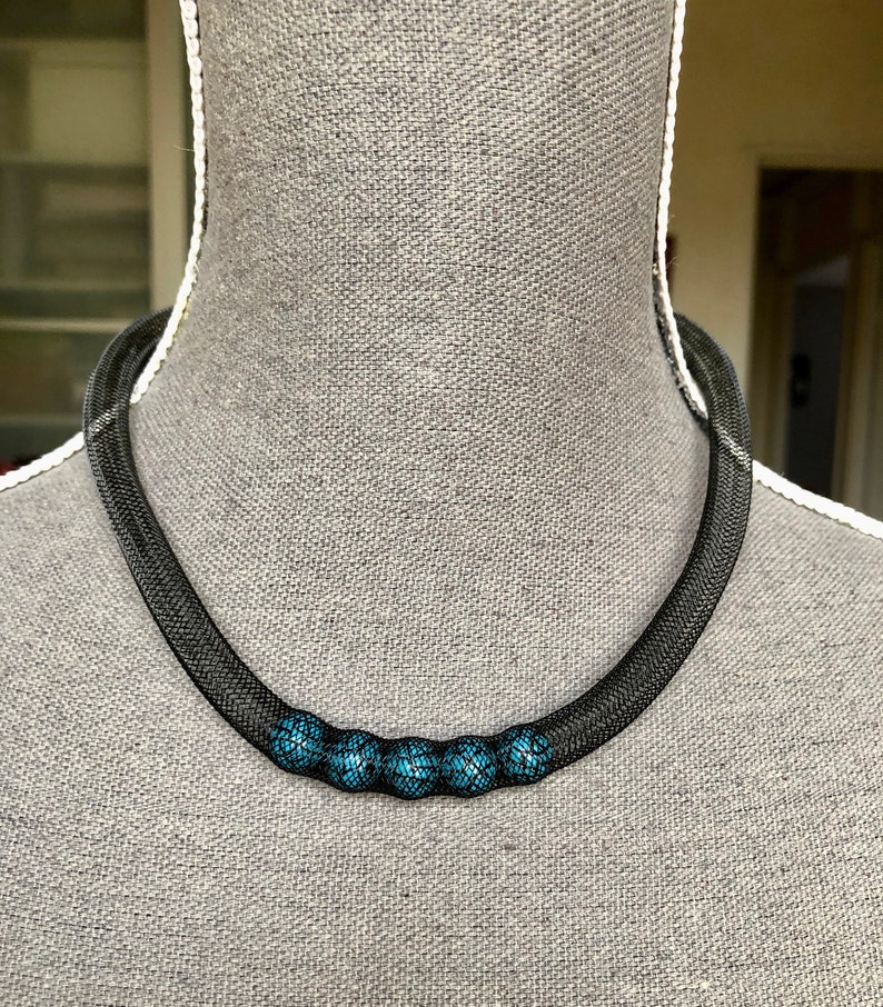 Black fishnet necklace with 5 turquoise and black beads