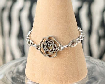 Flexible ball chain ring in fine gold-plated brass or silver steel with a rose-shaped flower connector in the center for women