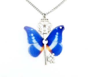 Collier clef papillon bleu