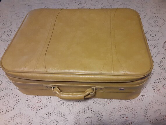 vintage american tourister luggage yellow
