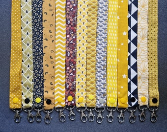 Key ring or badge holder - golden yellow tone