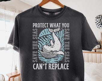 Maglietta corta da donna con grafica di balena, ispirata alla vita marina e alla costa, regalo estivo da spiaggia per lei. Salva i nostri oceani, rispetta la gente del posto.
