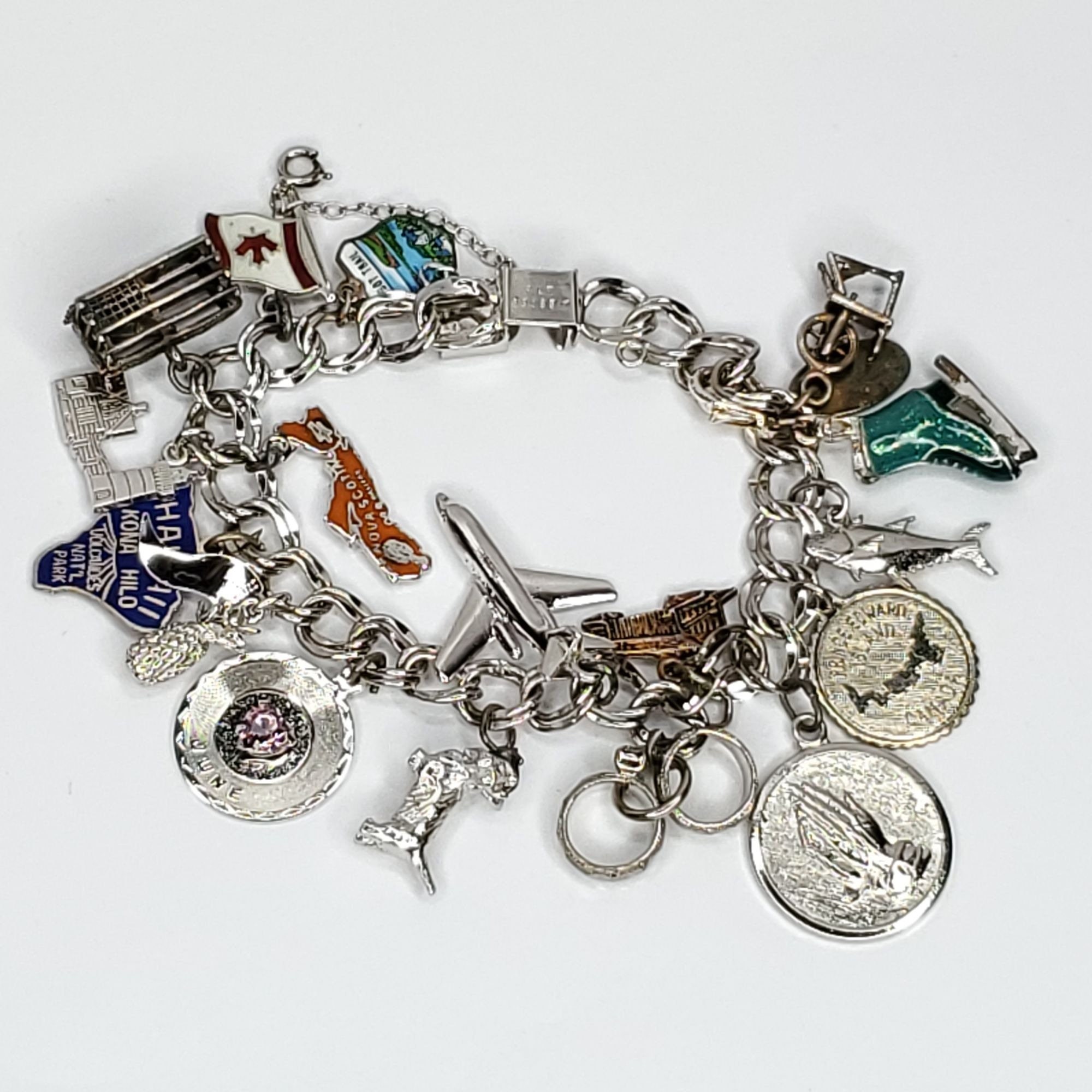 Vintage Sterling Silver 17 Charm Bracelet