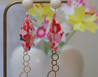 Pink and white origami earrings with white studs and golden medallions