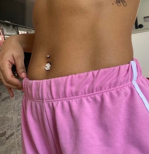 Shell belly clearance button ring