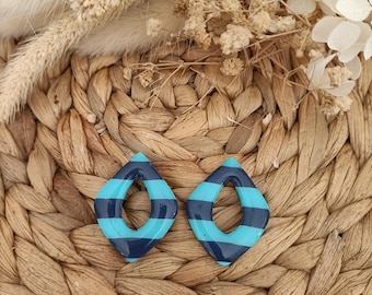 Utbytbara örhängen av polymerlera