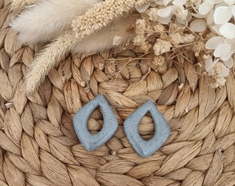 Utbytbara örhängen av polymerlera