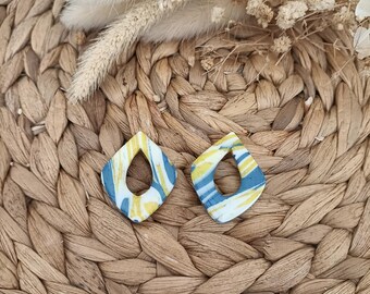 Utbytbara örhängen av polymerlera