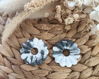 Utbytbara örhängen av polymerlera