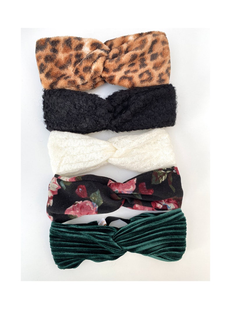 Crossed headbands all soft and warm from birth to adult.