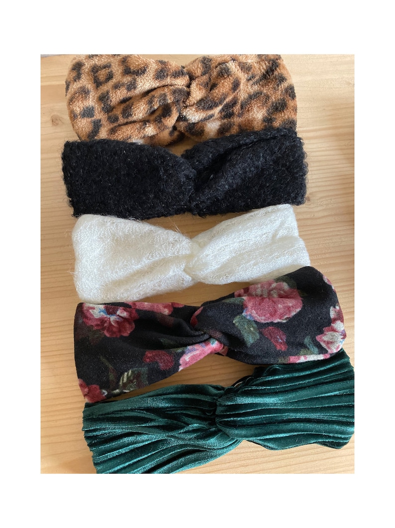 Crossed headbands all soft and warm from birth to adult.