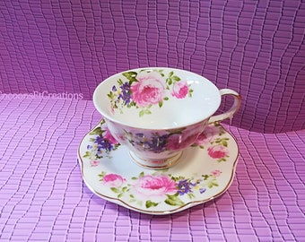 Tasse à thé, style anglais shabby. Fleurs roses