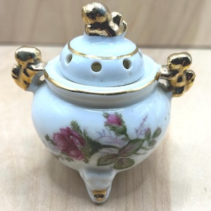 May include: A rustic wooden sign with the text "Welcome to our home" in white lettering. The sign features a distressed finish and a simple, inviting design, perfect for a front porch or entryway.