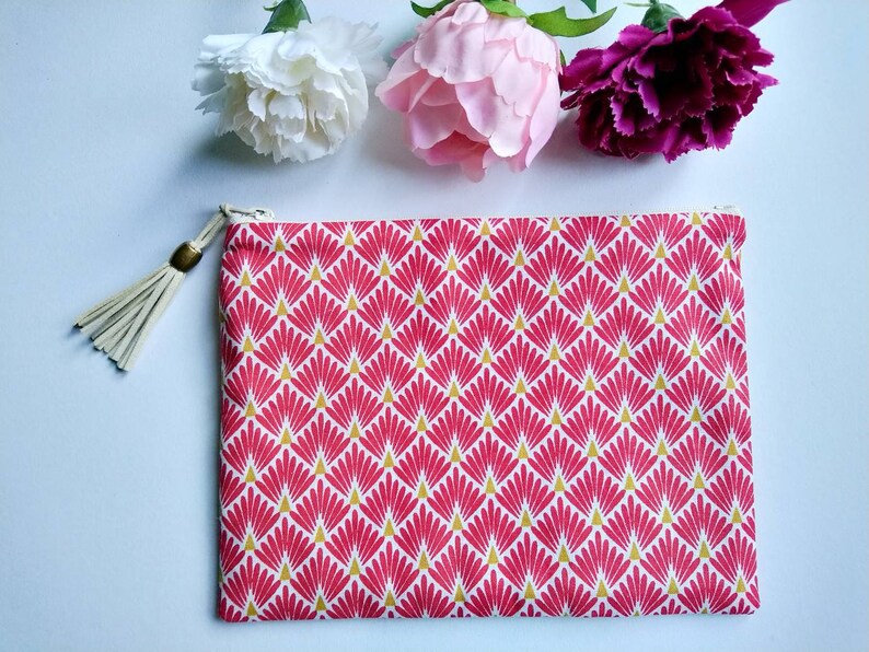 Make-up pouch in Japanese red and yellow shell fabric.