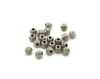 x20 petites perles toupie (4mm) métal couleur argenté