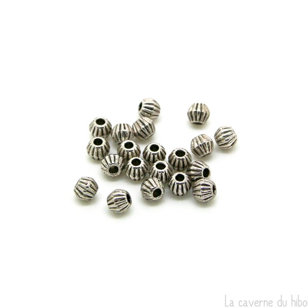 x20 petites perles toupie (4mm) métal couleur argenté