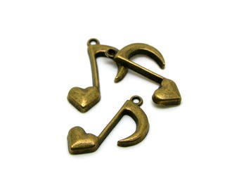 x2 pendentifs note de musique coeur (25,5x13mm) couleur bronze