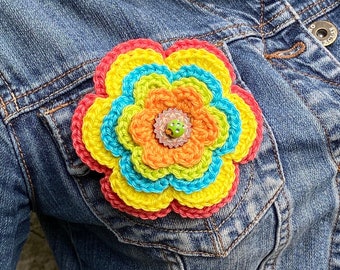 Large flower brooch in spring colors made with retro vintage crochet