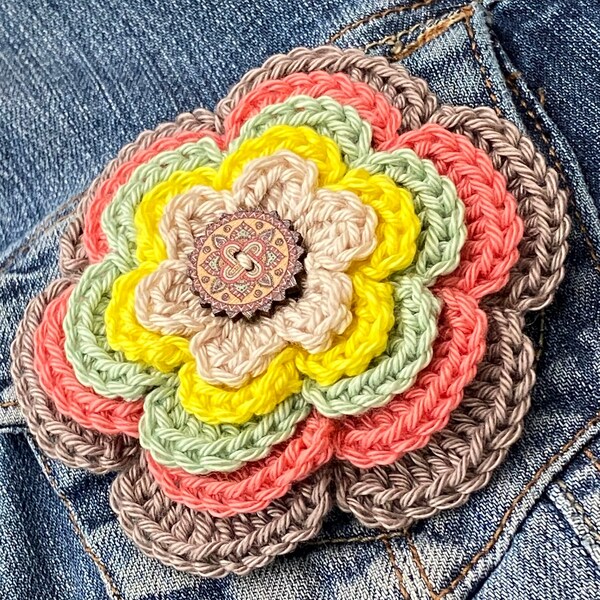 Large pastel-colored flower brooch made with retro vintage crochet