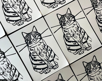 Magic cat linocut print in black