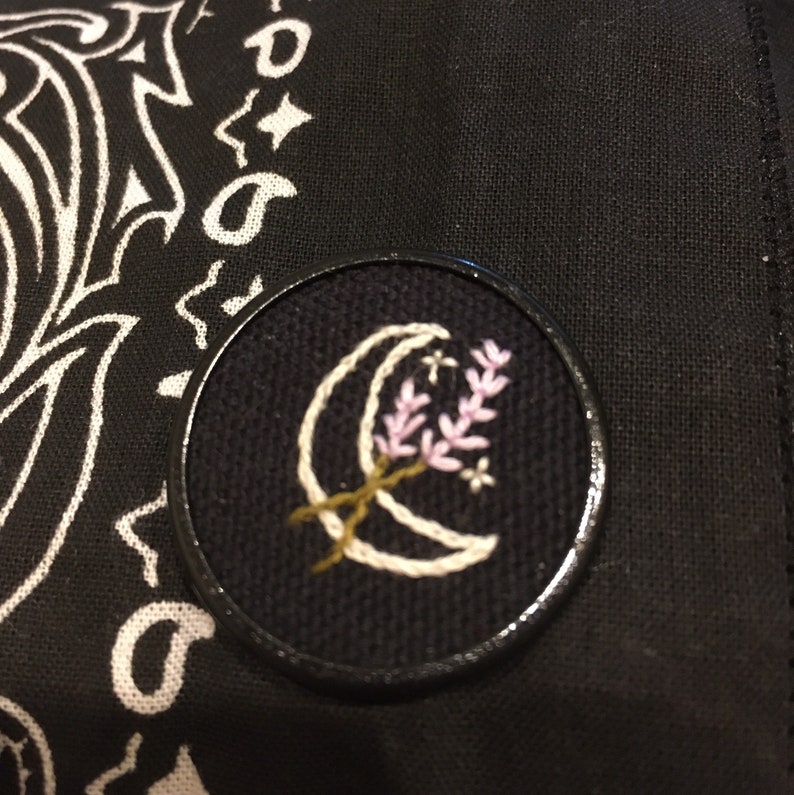 Lavender moon hand embroidered black pin