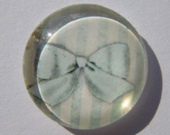 Glass cabochon round in 20 mm image bow with blue stripes vertical