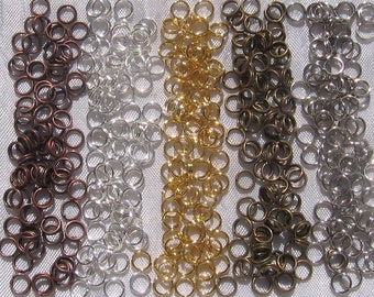 LOT de 100 ANNEAUX connecteurs DOUBLES 7mm x 1,2mm ARGENTE création bijoux A158