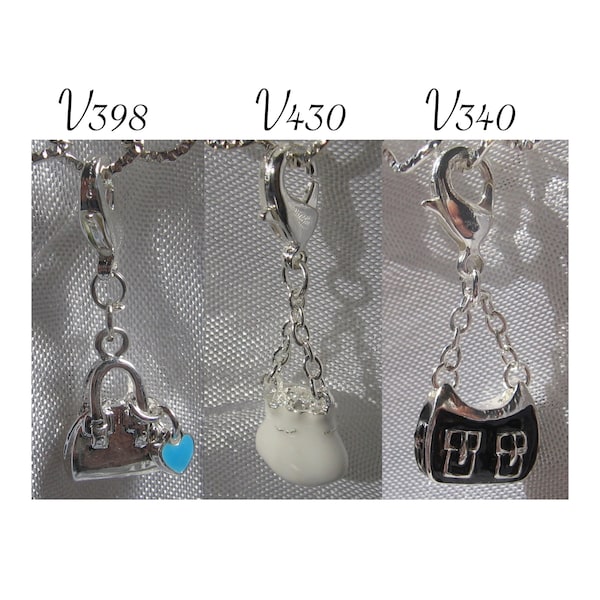 SAC charm, luxury bag, women's accessory, handbag, silver metal, silver bag, white bag, black bag, pendant, carabiner, V340, V398, V430