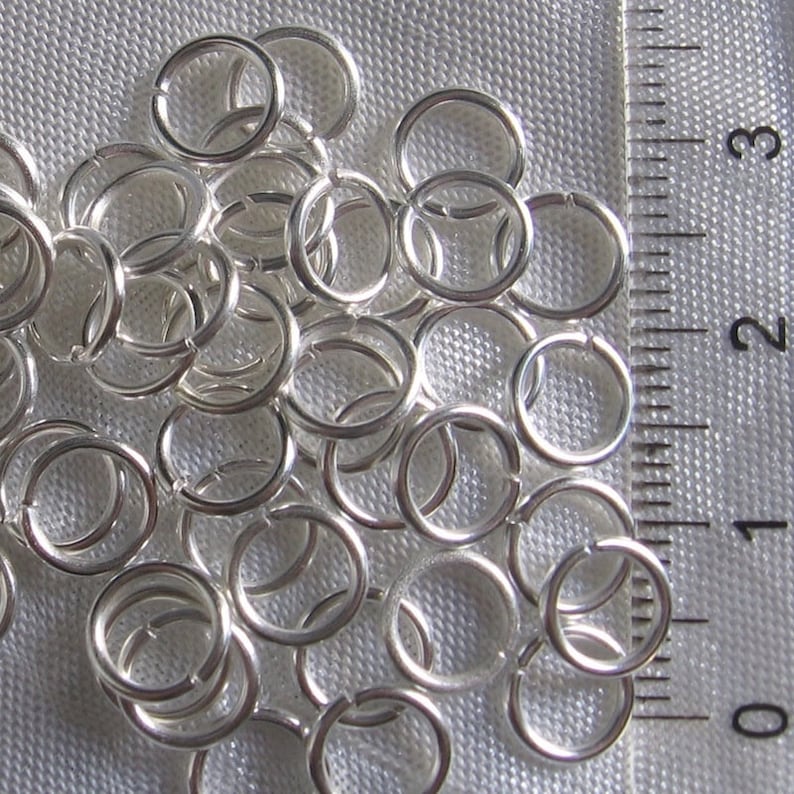 Anneaux argentés, anneaux de jonction, anneaux ouverts, métal argenté, au choix, anneaux 3mm, 4mm, 5mm, 6mm, 7mm, 8mm, breloques, A2,A54-A58 200 anneaux 7mm *A57