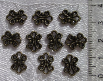 lot de 10 connecteurs, connecteurs bronze, métal bronze, fleurs bronze, connecteurs fleurs, estampes bronze, 12mm x 9mm, pour bracelets,J105