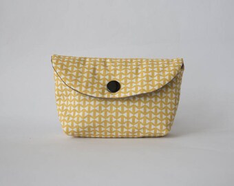Pouch or small wallet imprimepetits knots, saffron yellow cotton