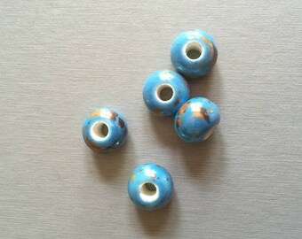 dix perles porcelaine bleu turquoise