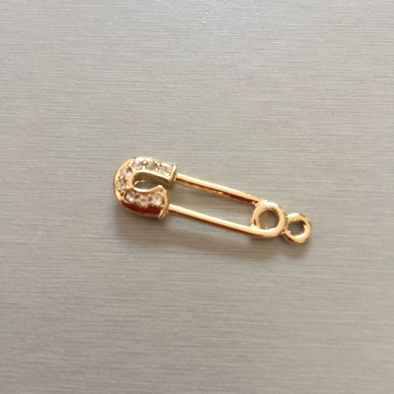 golden safety pin image 1