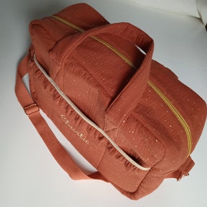 Customizable diaper bag, made of double gauze, rust color