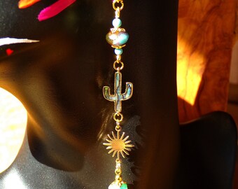multicolored handcrafted iridescent kokopelli engraved silver kokopelli 1.57 4 cm round Amerindian magnifying glass pendant