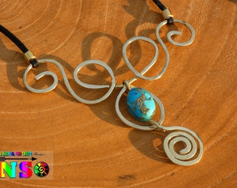May include: A silver necklace with a turquoise stone pendant and a black cord. The necklace features a swirling design with multiple loops.