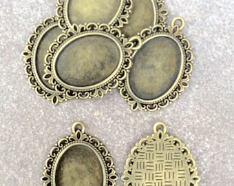 4 pendentifs festonnés support de  cabochon camée 18x25 mm en métal couleur bronze