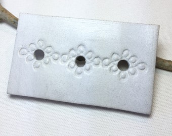 White ceramic soap holder imprint guipure