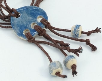 blue ceramic pendant and pearl necklace